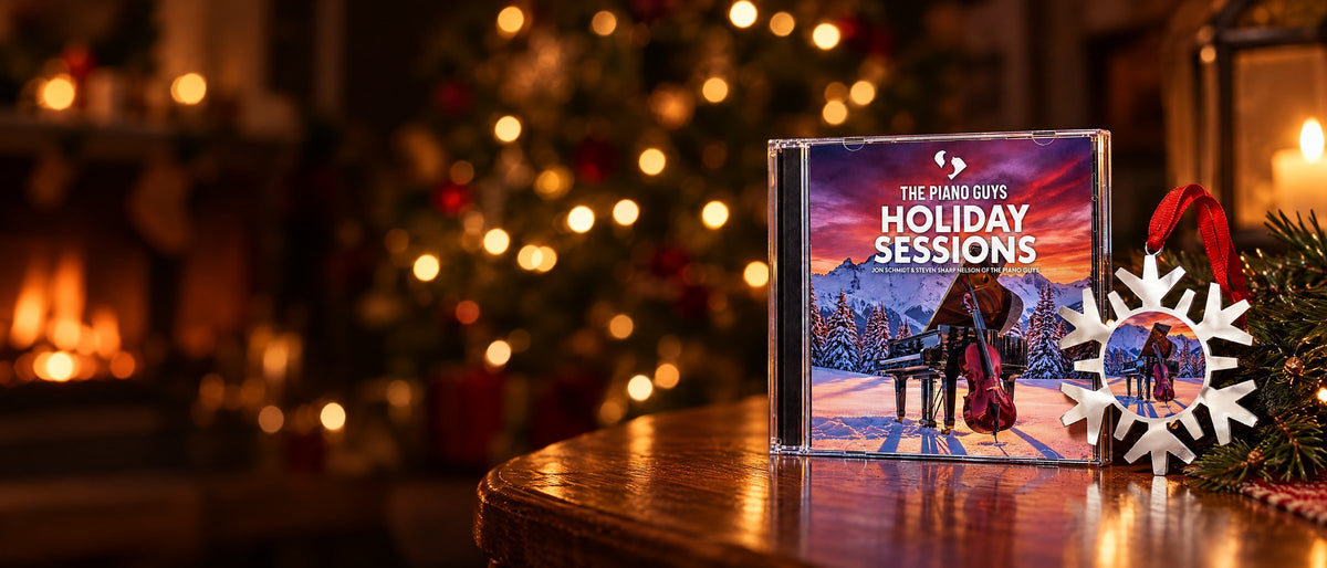 Holiday Sessions CD and snowflake ornament on a side table by the fire